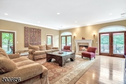 When you enter this room you can sense the outside.  So many windows and sunlight. High hat lighting is everywhere!  Open flow to the covered sunporch, deck and kitchen!