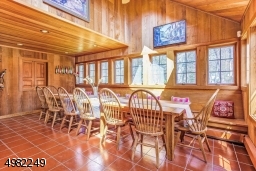 Sundrenched room with access to the backyard is a perfect place for whatever group activity you choose. Gather for a meal, for sewing, or for arts and crafts, you will find that this room is so versatile!