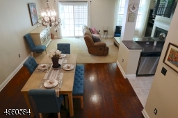 Beautiful hardwood floors welcome you into the lovely dining area, beautiful kitchen with breakfast bar and spacious living room.