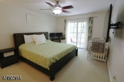 Spacious and sunny master bedroom.