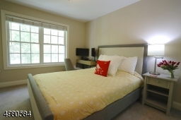 Comfortable and sunny second bedroom.