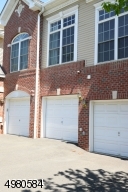 Protect your car from the elements in this attached garage which leads directly to the interior mudroom and laundry room.