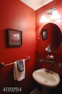 This first floor powder room is a convenient addition to the two full baths on the second floor.