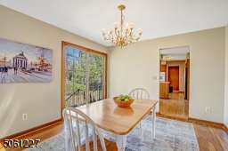 Wood floors  Sliding doors leading to patio/backyard