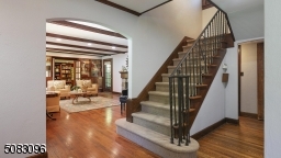 Elegant staircase graces the center hall