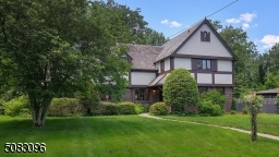 Beautifully set back on magnificent property on one of Westfield's premier streets just a short distance from town, train and schools.