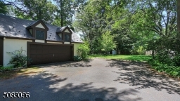 Oversized two car garage with plenty of extra storage room and a walk up loft.