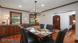 Hardwood floors, custom built-in buffet, recessed lights & tons of natural light