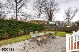 Backyard offers a park-like setting.  Enjoy a  large paver Patio with access from Kitchen & Great Room.
