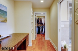 Sitting room or office - or possible nursery!  Built-in shelves.  Leads to huge walk-in closet-w/built-in shelving.
