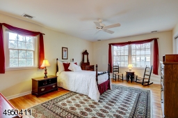 Over-sized Bedroom! - bright with many windows! good closet space.