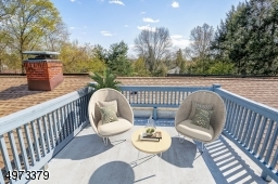 Entertaining at home gets even better with your own private rooftop deck! Virtually Staged.