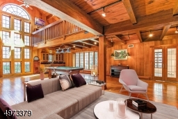 This room has so many possibilities, -  reading your favorite book, playing a game of pool, or simply relaxing with friends!  Virtually Staged.
