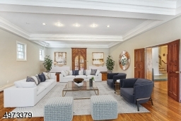 This Family Room is truly a Great Room!  Enter from either the Living Room or Library, and even from the outside. Watch your favorite movie on TV, gather with friends, host a party - this room is meant for entertaining! Virtually Staged.