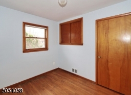 Third bedroom hardwood floors and freshly painted.