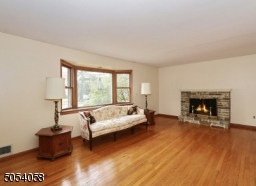 Sun filled living room with bay window