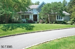 The home sits perfectly on the property with beautiful mature landscape.