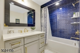 Main bathroom on second floor delights with its upscale fixtures