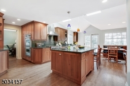 Center island with bar seating, granite counters, ss appliances and so much more!
