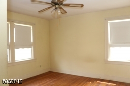 BR #1 has windows on 2 sides; hardwood floors; ceiling fan