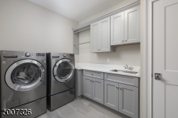 LG washer/dryer, quartz counter tops and upgraded tile flooring.