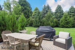 This backyard is one of the most beautiful, quiet locations, backing up to a beautiful tree setting.