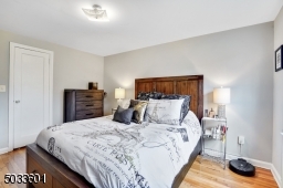 Hardwood floors and painted in today's modern color.