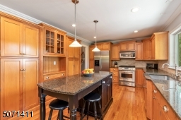 Granite Counters, Maple Cabinetry