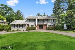 Belgian block Circular driveway Portico/covered front porch Double-paneled front door