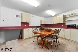 Kitchen with double sliders leading to a covered outdoor entertaining space
