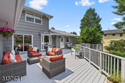 Access via glass sliders from the Kitchen and Family Room makes outdoor entertaining easy and seamless.
