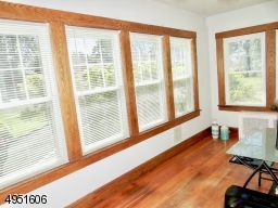All Seasons Sun filled Sunroom with walls of windows