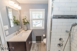 2018 bathroom w/ graceful tile work & fixtures