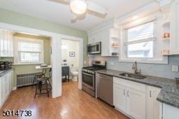 2018 kitchen w/ plenty shaker cabinetry & sleek granite counters
