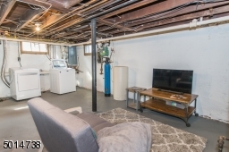 not afraid to do laundry in this bright, clean basement!