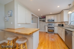 Generous cabinet space and breakfast bar