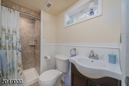 Lower level 3rd full bath with stall shower