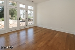 One of three additional ground level bedrooms with terrace