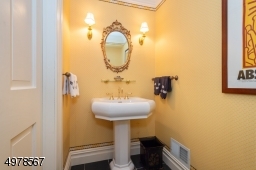 This elegantly appointed powder room serves guests on the main floor.