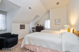 Bedroom 4 is smaller and copier than bedroom 3, this 15x11 top floor bedroom overlooks the courtyard and has two dormer windows with large closet