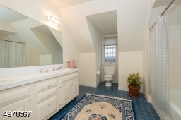 Top floor bath is shared by bedrooms 3 and 4