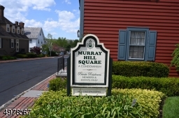 This unique community was built as a shopping center but stores were retrofitted as residences.  Built to commercial standards with steel beam construction.