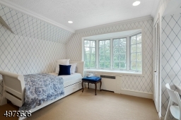 two closets, wood floors under carpet