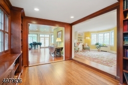 wood trim, built ins, hardwood floors
