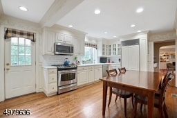 another view of the kitchen, side door that is convenient to the patio