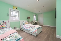 with custom, two large closets on both sides; build in speakers, recess lights