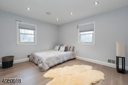 with large custom closet, recess lights, build in speakers