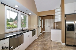 window over sink & 2 dishwashers