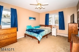 Large room, with a queen size bed