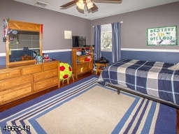 15' bedroom with paddle fan